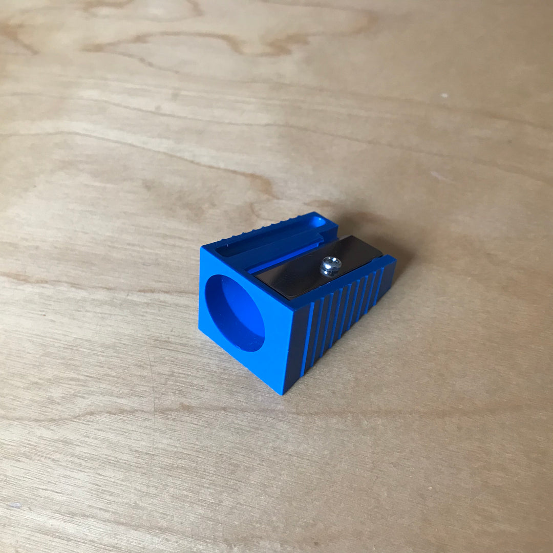 Sharpener for triangular Pencils and Wax Crayons