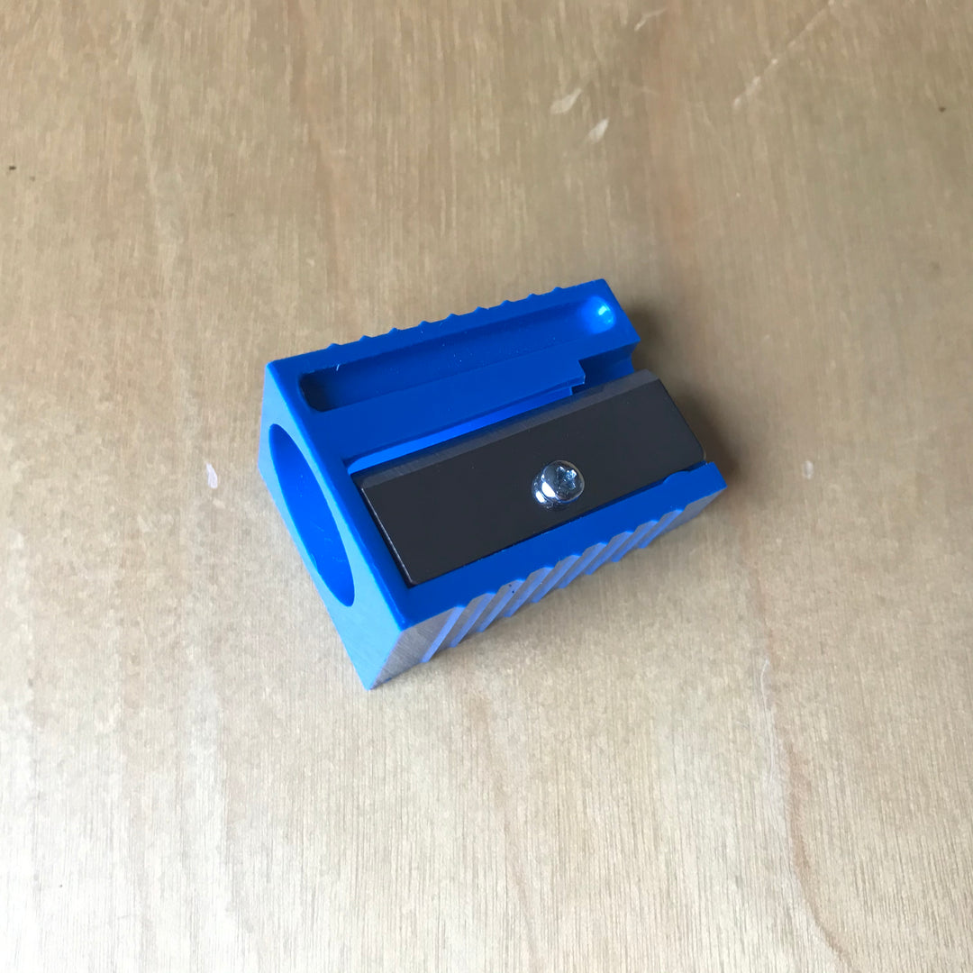 Sharpener for triangular Pencils and Wax Crayons